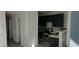 Kitchen with dark cabinets and stainless steel appliances at 3318 N Decatur Blvd # 1073, Las Vegas, NV 89130