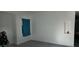 Bright living room with gray flooring and a teal curtain at 3318 N Decatur Blvd # 1073, Las Vegas, NV 89130