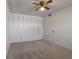 Spacious bedroom with ample closet space and neutral carpeting at 350 E Desert Inn Rd # H208, Las Vegas, NV 89109