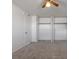 Large bedroom with a ceiling fan and plenty of closet space at 350 E Desert Inn Rd # H208, Las Vegas, NV 89109