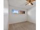 Well-lit bedroom with ceiling fan and window at 350 E Desert Inn Rd # H208, Las Vegas, NV 89109