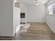 Bright dining area with wood-look floors and ceiling fan at 350 E Desert Inn Rd # H208, Las Vegas, NV 89109
