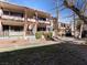 Building exterior with landscaping and walkways at 350 E Desert Inn Rd # H208, Las Vegas, NV 89109
