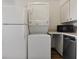 Stackable washer and dryer in the kitchen area at 350 E Desert Inn Rd # H208, Las Vegas, NV 89109