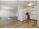 Open concept living area and kitchen with new floors at 350 E Desert Inn Rd # H208, Las Vegas, NV 89109