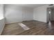 Spacious living room featuring hardwood floors and natural light at 350 E Desert Inn Rd # H208, Las Vegas, NV 89109