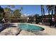 Inviting community pool with surrounding patio furniture at 350 E Desert Inn Rd # H208, Las Vegas, NV 89109