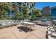 Outdoor kitchen and dining area with seating at 353 E Bonneville Ave # 711, Las Vegas, NV 89101