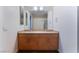 Double vanity bathroom with light wood cabinets at 353 E Bonneville Ave # 711, Las Vegas, NV 89101