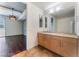 Double vanity bathroom with view into living room at 353 E Bonneville Ave # 711, Las Vegas, NV 89101