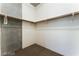 Walk-in closet with wood shelving at 353 E Bonneville Ave # 711, Las Vegas, NV 89101