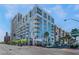 Modern high-rise building with city views and street-level retail at 353 E Bonneville Ave # 711, Las Vegas, NV 89101