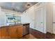 Modern condo kitchen with stainless steel appliances and wood cabinets at 353 E Bonneville Ave # 711, Las Vegas, NV 89101