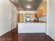Modern kitchen features light wood cabinets and stainless steel appliances at 353 E Bonneville Ave # 711, Las Vegas, NV 89101