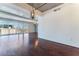 Spacious living room with hardwood floors and city views at 353 E Bonneville Ave # 711, Las Vegas, NV 89101