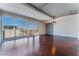 Bright living room with hardwood floors and floor to ceiling windows at 353 E Bonneville Ave # 711, Las Vegas, NV 89101