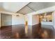 Open concept living area with hardwood floors and kitchen view at 353 E Bonneville Ave # 711, Las Vegas, NV 89101