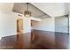 Living room with hardwood floors and access to balcony at 353 E Bonneville Ave # 711, Las Vegas, NV 89101