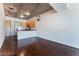 Open living area with hardwood floors and city views at 353 E Bonneville Ave # 711, Las Vegas, NV 89101