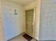 Inviting condo entry with security door and neutral walls at 3550 Bay Sands Dr # 1070, Laughlin, NV 89029