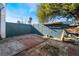 Spacious backyard with flagstone patio and storage area at 4071 Village Sq, Las Vegas, NV 89121