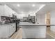 Modern kitchen with white cabinets and island at 4071 Village Sq, Las Vegas, NV 89121