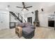 Living room showcasing a cozy sectional sofa and a fireplace at 4071 Village Sq, Las Vegas, NV 89121