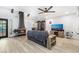 Cozy living room with fireplace and large TV at 4071 Village Sq, Las Vegas, NV 89121