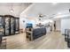 Open living room with modern flooring and kitchen views at 4071 Village Sq, Las Vegas, NV 89121