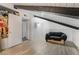Spacious loft features wood floors and access to a bathroom at 4071 Village Sq, Las Vegas, NV 89121