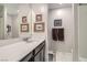 Bathroom featuring a large mirror, a gray cabinet, and a single sink at 495 Granite Arch St, Las Vegas, NV 89138