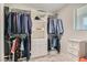 Walk-in closet with lots of storage space featuring shelving, drawers and hanging racks at 495 Granite Arch St, Las Vegas, NV 89138