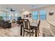 Open concept dining area with adjacent living room at 495 Granite Arch St, Las Vegas, NV 89138