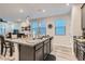 Spacious kitchen with an island, granite countertops, and modern cabinetry at 495 Granite Arch St, Las Vegas, NV 89138