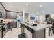 Open concept kitchen featuring granite countertops and stainless steel appliances at 495 Granite Arch St, Las Vegas, NV 89138