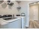 Laundry room with washer and dryer units plus a shelf at 495 Granite Arch St, Las Vegas, NV 89138