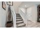 Modern staircase with gray carpeting and white railings at 495 Granite Arch St, Las Vegas, NV 89138