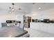 Modern kitchen with white cabinets and stainless steel appliances at 6017 Natures Dr, Las Vegas, NV 89122