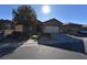 Single-story house with attached garage and landscaping at 6119 Forest Pony Ave, Las Vegas, NV 89122