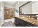 Bathroom with granite vanity and large shower at 7036 Winstar St # A, Las Vegas, NV 89131