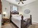 Spacious bedroom with large bed and ceiling fan at 7036 Winstar St # A, Las Vegas, NV 89131