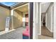 Private courtyard entrance with a seating area, offering a tranquil entryway to the home at 7036 Winstar St # A, Las Vegas, NV 89131