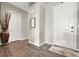 Bright entryway with hardwood floors and tall ceilings at 7036 Winstar St # A, Las Vegas, NV 89131