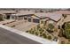 Single-story house with landscaped yard and three-car garage at 7036 Winstar St # A, Las Vegas, NV 89131