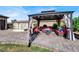 Covered gazebo with seating area in backyard at 7036 Winstar St # A, Las Vegas, NV 89131