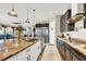 Modern kitchen with granite countertops and ample cabinetry at 7036 Winstar St # A, Las Vegas, NV 89131