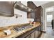 Modern kitchen features gas cooktop and ample counter space at 7036 Winstar St # A, Las Vegas, NV 89131
