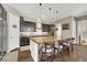 Modern kitchen with an island, stainless steel appliances, and custom cabinetry at 7036 Winstar St # A, Las Vegas, NV 89131