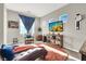 Relaxing living room with chaise lounge and large TV at 7036 Winstar St # A, Las Vegas, NV 89131