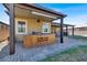 Rustic outdoor kitchen with a wood countertop and a paver patio at 7036 Winstar St # A, Las Vegas, NV 89131